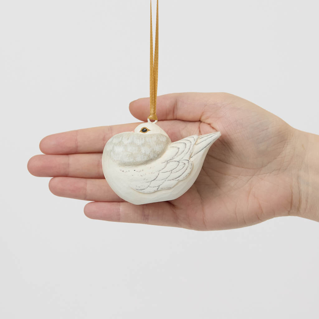A handmade Holle Cropper Pigeon Ornament featuring a hand-painted resin bird with a distinctive puffed chest, creamy white plumage, and satin hanging ribbon.