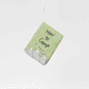 Handmade felt How to Camp Book ornament from Craftspring shown flipping through interior pages—featuring intricate beaded and embroidered details inspired by camping essentials, ethically crafted by artisans using sustainable wool.