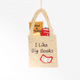 Handmade felt ornament shaped like a tote bag filled with miniature felt books, including titles like Pride & Prejudice and War & Peace. Crafted from soft merino-blended wool, this quirky ornament is a playful nod to literary humor. Perfect for bookworms, teachers, librarians, and pun enthusiasts, it adds a clever touch to holiday trees, bookshelves, or classrooms. Ready to hang with a string attached. GIF 360 degree view
