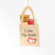 Handmade felt ornament shaped like a tote bag filled with miniature felt books, including titles like Pride & Prejudice and War & Peace. Crafted from soft merino-blended wool, this quirky ornament is a playful nod to literary humor. Perfect for bookworms, teachers, librarians, and pun enthusiasts, it adds a clever touch to holiday trees, bookshelves, or classrooms. Ready to hang with a string attached.