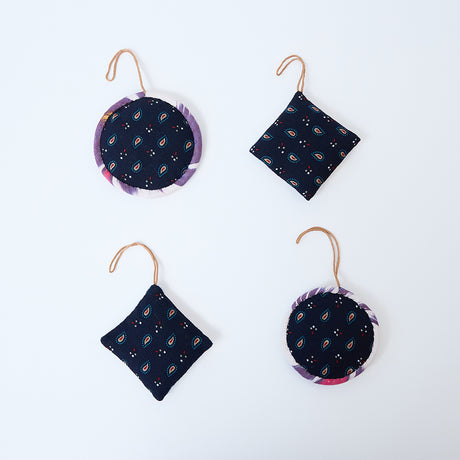 Handmade Ikat Quilted Ornaments, Set of 4, from Craftspring—showing the back of each ornament with distinct quilted designs, heirloom-quality holiday decor, ethically handmade by artisans.