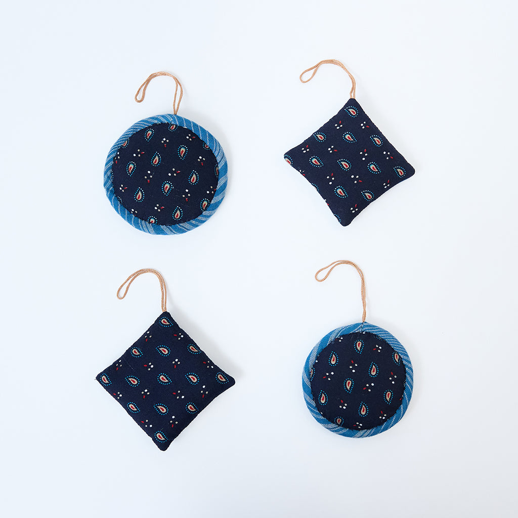 Handmade Indigo Quilted Ornaments, Set of 4, from Craftspring—showing the back of each ornament with distinct quilted designs, heirloom-quality holiday decor, ethically handmade by artisans.