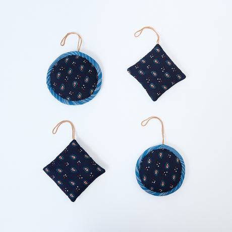 Handmade Indigo Quilted Ornaments, Set of 4, from Craftspring—showing the back of each ornament with distinct quilted designs, heirloom-quality holiday decor, ethically handmade by artisans.