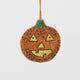 A vintage-inspired handmade beaded Jack O’Lantern Ornament featuring a smiling embroidered pumpkin face on one side and festive “Trick or Treat” detailing on the reverse.