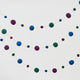 Handmade felt Jewel Tone Ball Garland from Craftspring, featuring deep jewel-tone felt balls strung on a gold ribbon—heirloom-quality holiday decor perfect for adding rich, festive color, ethically crafted by artisans using sustainable wool.