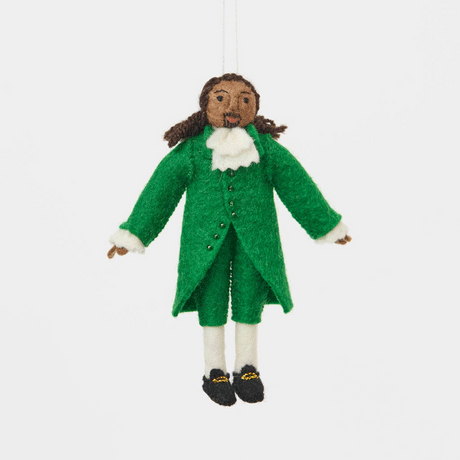 Celebrate the cultural phenomenon that brought Revolutionary history to a new generation with our handcrafted Lin-Manuel Miranda as Hamilton Ornament. Inspired by his iconic portrayal of Alexander Hamilton, this felt ornament captures the energy, creativity, and theatrical spirit of a groundbreaking American story.