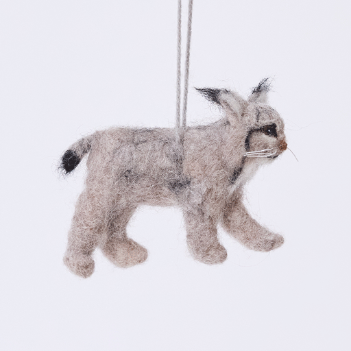 Handmade felt Lynx ornament from Craftspring rotating to show front, side, and back views — realistic needle-felted details with whiskers, ear tufts, and a lifelike face, ethically crafted by artisans using sustainable wool.