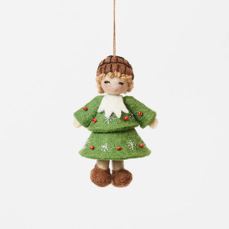 Inspired by the gentle wonder of Waldorf traditions, our Little Acorn Kid Ornament captures the whimsical spirit of a woodland fairy tale. Wearing an adorable felted acorn cap and a charming oak-leaf skirt.