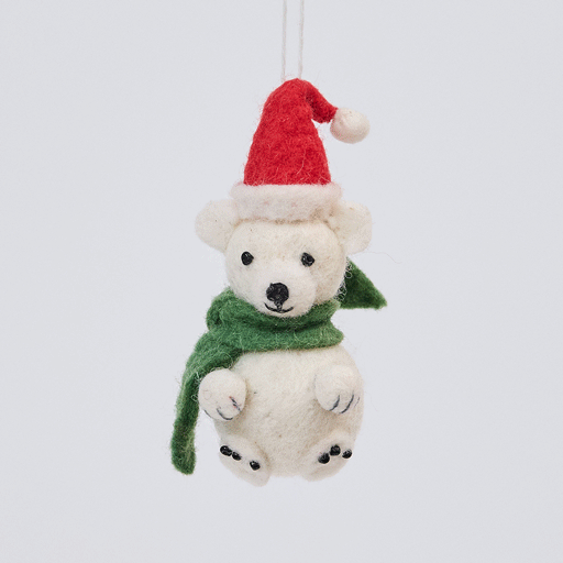 Handmade felt Little Drop Polar Bear ornament from Craftspring rotating to show front, side, and back views—featuring a Santa hat and green scarf with detailed stitching, showcasing heirloom craftsmanship, ethically crafted by artisans using sustainable wool.