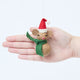 Craftspring’s Little Drop Santa Mouse Ornament displayed in front of a hand to show its size—handmade felt mouse with Santa hat and cute nose, heirloom-quality Christmas decor, perfect for holiday gifting, ethically handcrafted by artisans using sustainable wool.
