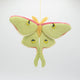 Pollinator-themed wool ornament featuring a luminous Luna Moth with fair trade craftsmanship