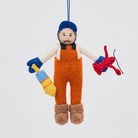 Whimsical felt Maine Lobsterman Christmas ornament from Craftspring, shown from multiple angles to highlight his fishing bib, red lobster, and buoy—heirloom-quality coastal holiday decor, ethically handmade by artisans using sustainable wool.