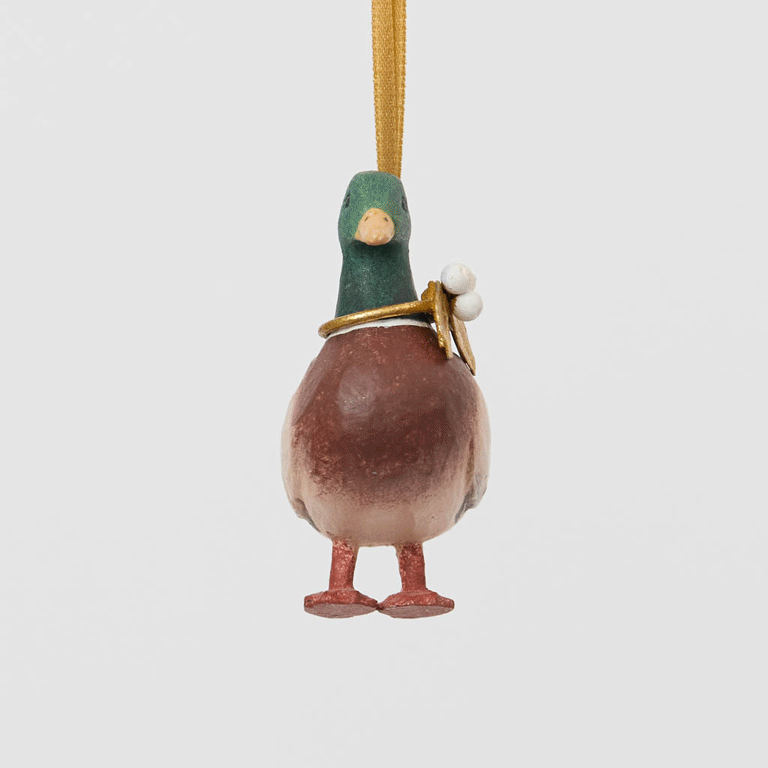 A vintage-inspired Mallard Duck Resin Ornament, hand-painted in the Philippines with a golden metal holly necklace and satin hanging ribbon.
