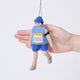 Craftspring’s Marathon Runner ornament held in front of a hand to show its size—handmade from sustainable wool with a race bib numbered 001 and an armband, ethically crafted by artisans using sustainable wool.
