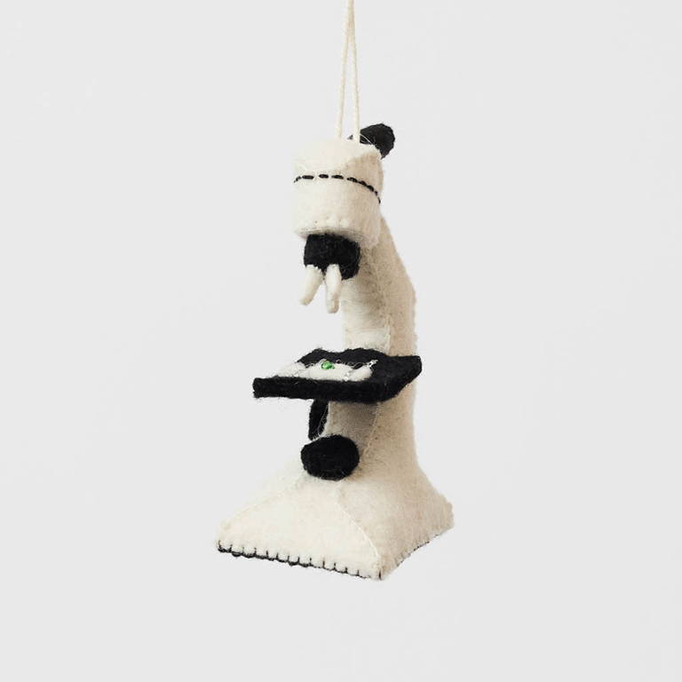 Celebrate curiosity, discovery, and the wonders of science with our handmade Felt Microscope Ornament — a charming keepsake perfect for scientists, biology lovers, teachers, researchers, lab technicians, and STEM enthusiasts.