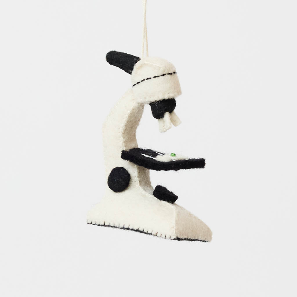 Celebrate curiosity, discovery, and the wonders of science with our handmade Felt Microscope Ornament — a charming keepsake perfect for scientists, biology lovers, teachers, researchers, lab technicians, and STEM enthusiasts.