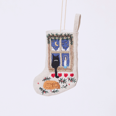 Handmade linen Holiday Cats Mini Stocking ornament from Craftspring rotating to show front, side, and back views—featuring intricate beaded and embroidered details of a cozy holiday scene with two cats and a window, ethically crafted by artisans using sustainable materials.