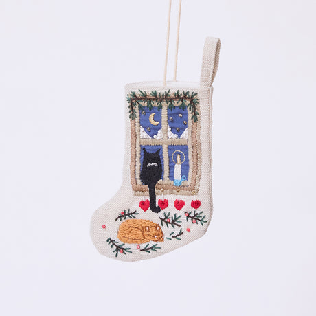 Handmade linen Holiday Cats Mini Stocking ornament from Craftspring, featuring intricate beaded and embroidered details of a cozy holiday scene with two cats and a window—heirloom-quality Christmas decor, ethically crafted by artisans using sustainable materials.