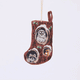 Handmade linen Woodland Mini Stocking ornament from Craftspring rotating to show front, side, and back views—featuring intricate beaded and embroidered details with animals peeking out of holes in a tree, including an owl, raccoon, and squirrel, ethically crafted by artisans using sustainable materials.