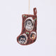 Handmade linen Woodland Mini Stocking ornament from Craftspring, featuring intricate beaded and embroidered details with animals peeking out of holes in a tree, including an owl, raccoon, and squirrel—heirloom-quality Christmas decor, ethically crafted by artisans using sustainable materials.