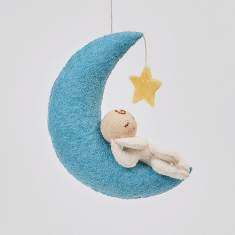Handmade felt Moon Dreamer Baby Ornament – Light from Craftspring rotating to show front, side, and back views—featuring a sleeping baby with light skin on a crescent moon with a dangling star, with delicate embroidered details that highlight its heirloom quality, ethically crafted by artisans using sustainable wool.