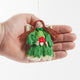 Woodland fairy ornament with red felt mushroom – handmade from merino wool