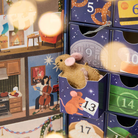 Advent Detail - Countdown to Holiday Magic in iconic style, with our handmade New York City Advent calendar featuring 24 miniature felt ornaments inspired by the landmarks, foods, neighborhoods, and wonderfully quirky icons of NYC.