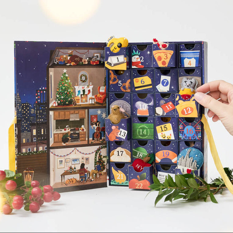 Countdown to Holiday Magic in iconic style, with our handmade New York City Advent calendar featuring 24 miniature felt ornaments inspired by the landmarks, foods, neighborhoods, and wonderfully quirky icons of NYC.
