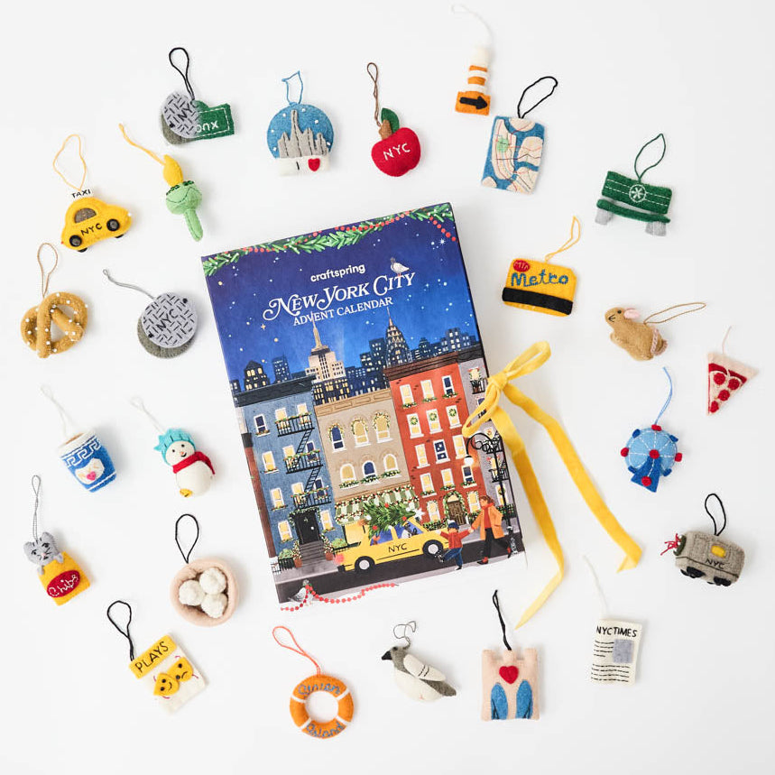 Christmas in New York, one tiny surprise at a time! Our NYC Advent Calendar turns the countdown to Christmas into a love letter to the city that never sleeps. Open a little numbered drawer each day to discover one of 24 handmade mini ornaments, each celebrating a piece of New York life.