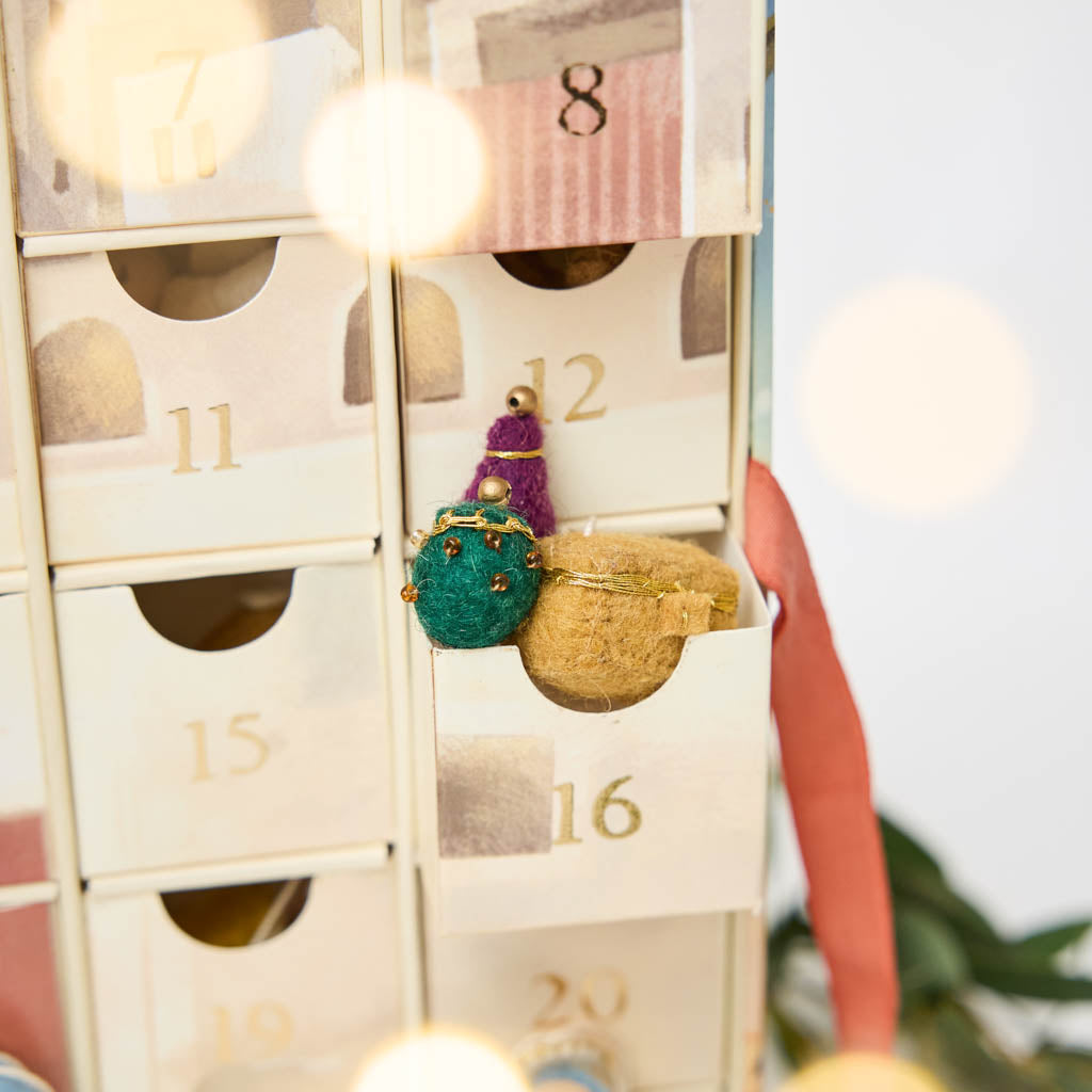 Some of the best holiday magic happens before the big day. Make each December morning special with an advent calendar that’ll be treasured year after year. Our Nativity Minis Advent Calendar is a reusable 24-day Christmas countdown filled with handcrafted mini felt ornaments that bring the Nativity story to life one tiny treasure at a time.