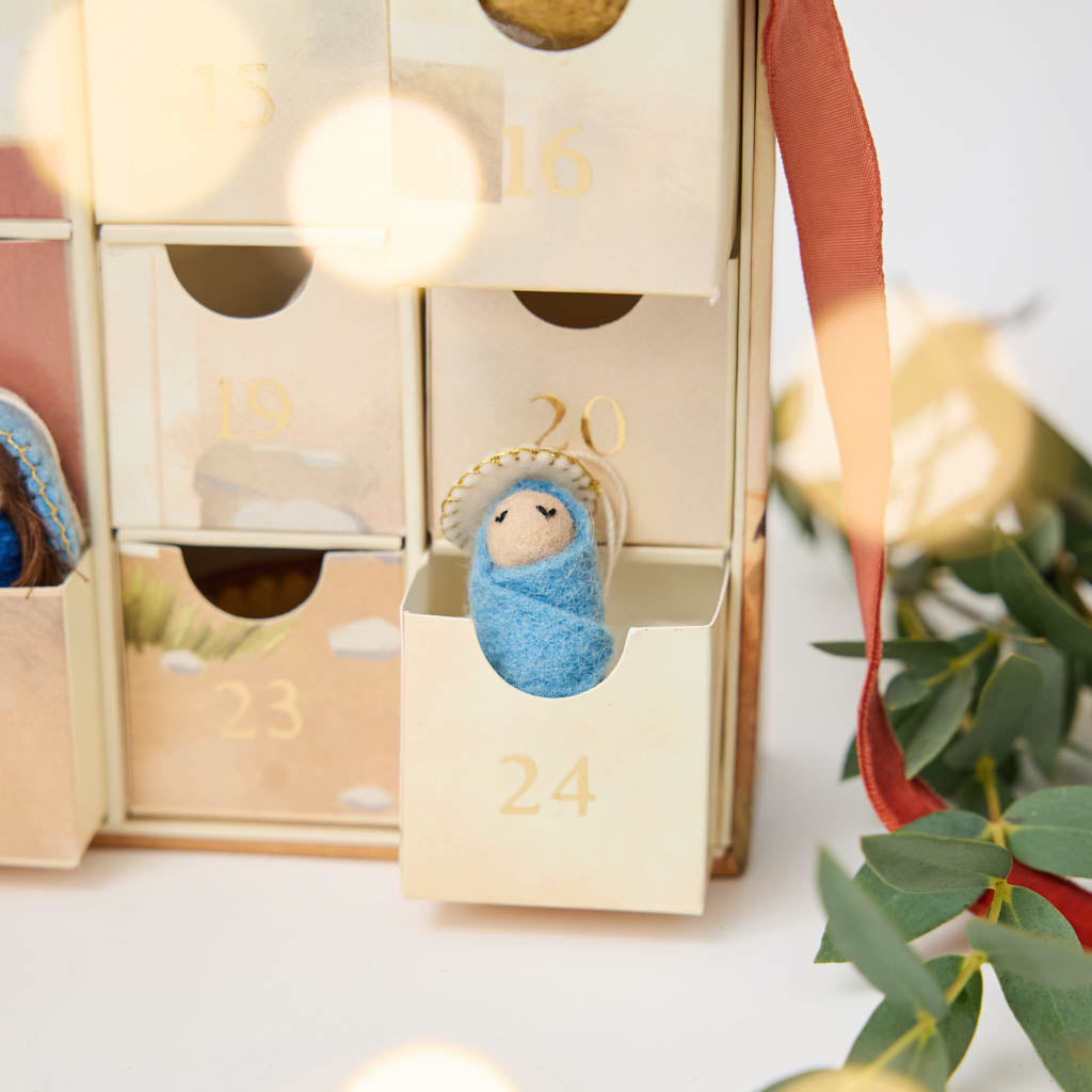 Some of the best holiday magic happens before the big day. Make each December morning special with an advent calendar that’ll be treasured year after year. Our Nativity Minis Advent Calendar is a reusable 24-day Christmas countdown filled with handcrafted mini felt ornaments that bring the Nativity story to life one tiny treasure at a time.