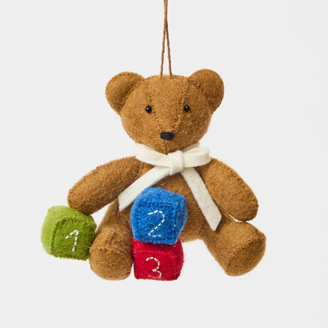 Cute as can be teddy! Our handmade felt teddy bear ornament is designed as a baby keepsake, perfect for baby showers, newborn gifts, and a baby’s first Christmas.