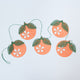 Paper Clementine Garland — set of 2 handmade garlands, each with 5 clementines featuring leaves and intricate cutout details, ethically handmade by artisans from recycled cotton waste — festive Christmas, holiday, and Lunar New Year decor, perfect for joyful gifting.