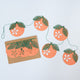 Paper Clementine Garland — set of 2 handmade garlands, each with 5 clementines featuring leaves and intricate cutout details, ethically handmade by artisans from recycled cotton waste — festive Christmas, holiday, and Lunar New Year decor, perfect for joyful gifting.