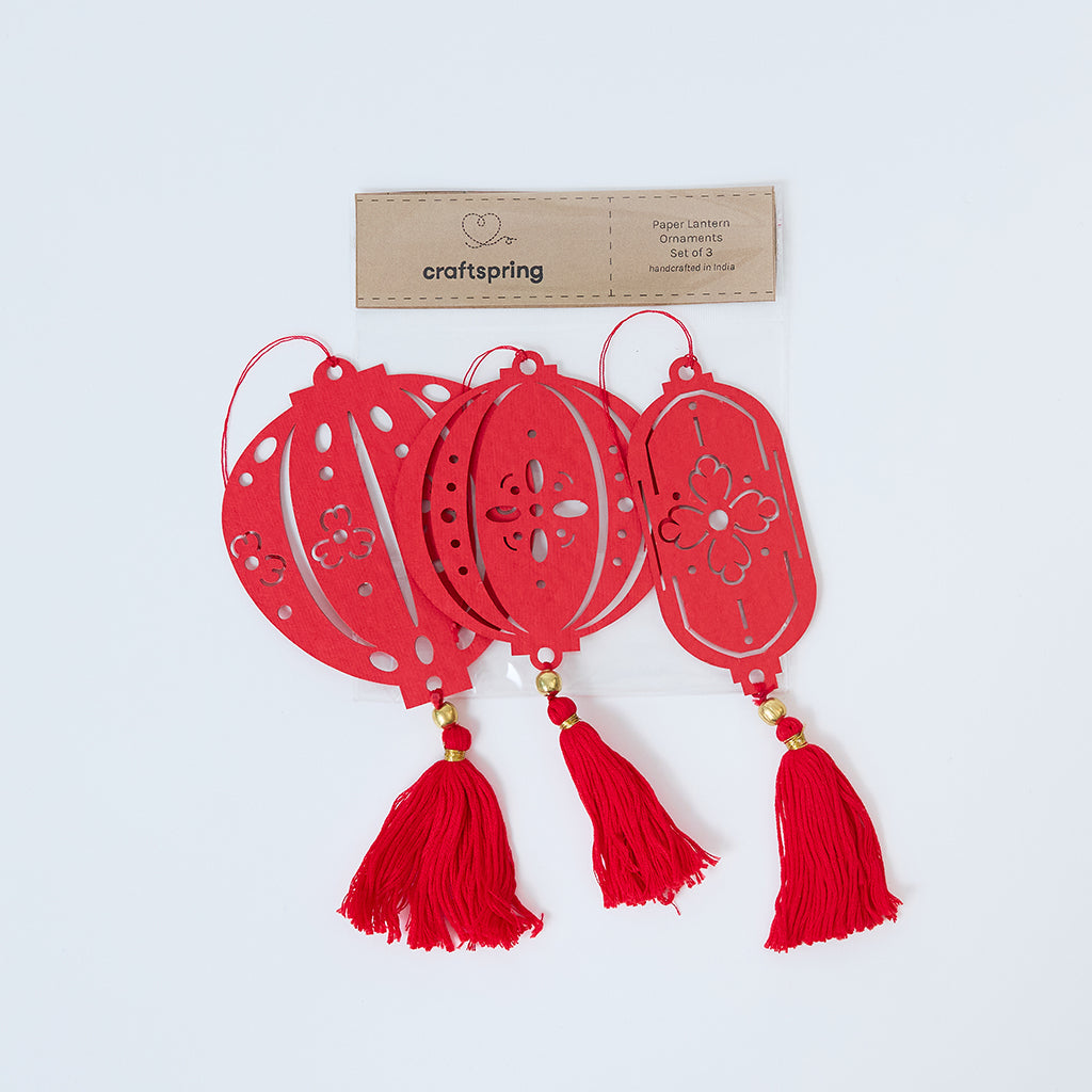 Paper Lantern Ornaments displayed on top of their clear bag packaging, ready to gift as heirloom-quality Lunar New Year decor.