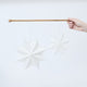 Craftspring’s Paper Snowflakes Christmas Ornaments — Set of 2, large white snowflakes with intricate cutout patterns, one slightly larger than the other —  ethically handmade by artisans from recycled cotton waste.