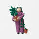For the person who always has room for just one more plant, our Plant Parent Ornament celebrates the love, care, and wonderfully leafy obsession of keeping a home full of green things. Handcrafted from natural wool by skilled artisans, this whimsical felt ornament features a proud plant parent dressed in purple and happily surrounded by an abundance of potted greenery.