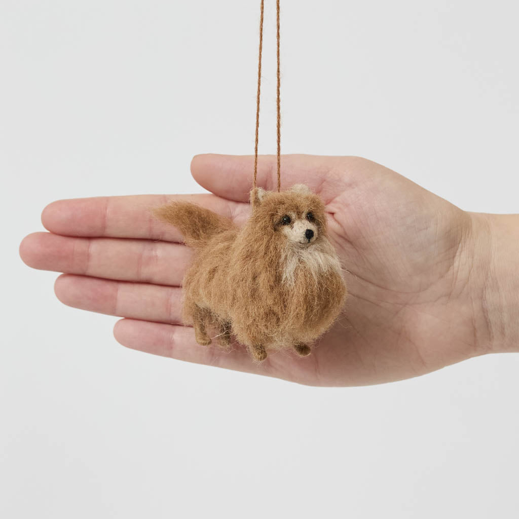 Small in size but big in personality, our alpaca Pomeranian Ornament brings the irresistible fluff and charm of this beloved breed to life. Carefully handcrafted by skilled artisans, this adorable ornament features a soft, full coat, bright eyes, and a sweet, alert expression that perfectly reflects the Pomeranian’s spirited nature.