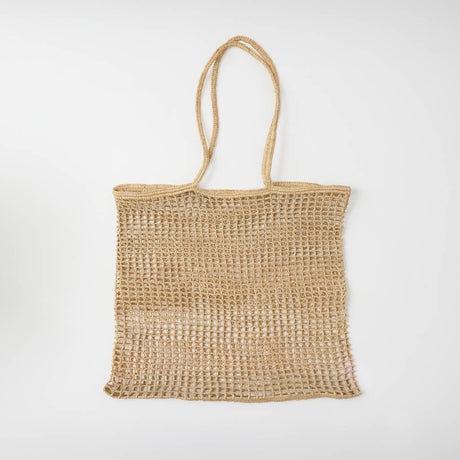 Effortlessly stylish and endlessly versatile, our Raffia Tote Bag is designed for beach days, market strolls, weekend getaways, and everyday adventures. Hand-crocheted from natural raffia fibers, this lightweight tote combines timeless coastal style with practical functionality, creating a beautiful accessory you'll reach for season after season.