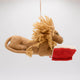Handmade felt ornament of a wise lion wearing tiny felt glasses, absorbed in a large red book. Crafted from natural wool, this charming lion adds a storybook touch to holiday trees, reading nooks, or cozy corners. A delightful gift for readers, teachers, librarians, or anyone who loves books and imagination. Each ornament is unique, crafted with care using traditional felting techniques.