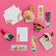 Reading-themed gift bundle featuring four handmade wool felt ornaments—a gnome reading a book, a lion with glasses holding a book, a young girl reading, and a fairy with wings reading—alongside a coordinating stationery set. Stationery includes a notepad, four illustrated notecards with envelopes, and four colorful bookmarks, all featuring characters from the Reading Collection. Ornaments are made from natural merino-blend wool and come ready to hang.
