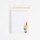A whimsical reading-themed stationery set, including a notepad, bookmarks, and notecards. Each piece features charming illustrations of a lion reading, a gnome with a book, and a fairy immersed in a story, all drawn in warm, detailed artwork. Printed on natural white textured paper, this set is perfect for journaling, letter writing, or marking your place in a book. A delightful gift for readers, teachers, and those who appreciate a touch of literary magic. Gnome with books notecard