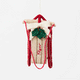 Our Red Flyer Sled Ornament captures the nostalgia of childhood winters and treasured holiday traditions. Inspired by classic wooden sleds, this charming keepsake features bright red runners, a cozy neutral-toned seat embroidered with "Flyer," and a festive holly sprig nestled beneath a soft white bow.