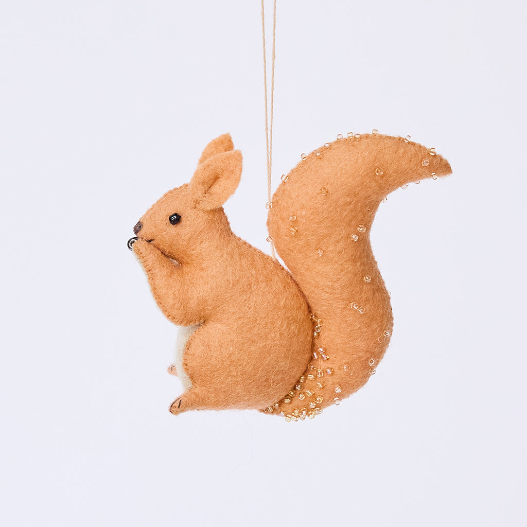 Handmade felt Red Squirrel ornament from Craftspring, featuring delicate beaded and embroidered details—heirloom-quality Christmas decor, ethically crafted by artisans using sustainable wool.