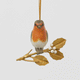 A vintage-inspired Robin Ornament, featuring a hand-painted red-breasted bird perched on a golden metal holly branch with white berries.