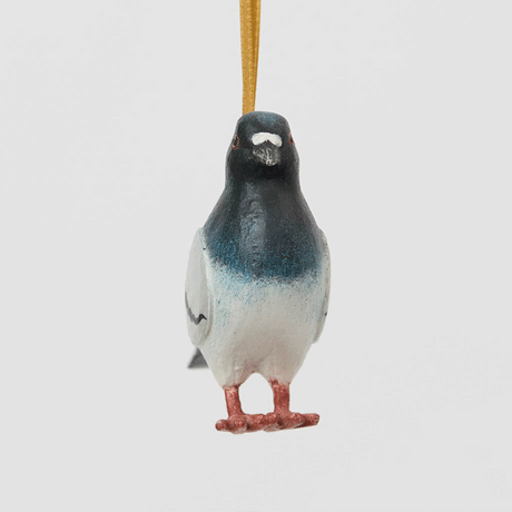 A hand-painted Rock Dove Pigeon Ornament, handmade in the Philippines with softly shaded details and a satin hanging ribbon.


A familiar city friend takes on old-world charm in our Rock Dove Pigeon Ornament. 
