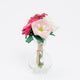 Artisan-crafted wool rose arrangement with wild rose stems and decorative bee, fair trade.