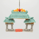 Felt Chinatown Gate ornament with embroidered dragons and jade roof, handmade by Kyrgyz artisans. Perfect Lunar New Year décor honoring Chinese tradition. GIF