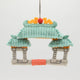 Felt Chinatown Gate ornament with embroidered dragons and jade roof, handmade and fair trade.
