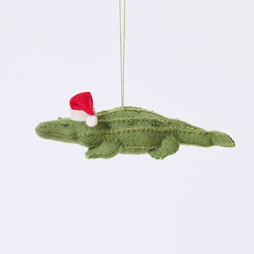 Craftspring’s Santa Alligator Ornament rotating to show front, side, and back views — felt alligator with a beautiful face and embroidered and beaded back ridges, a playful ornament perfect for holiday gifting — heirloom-quality Christmas decor, ethically crafted by artisans using sustainable wool.